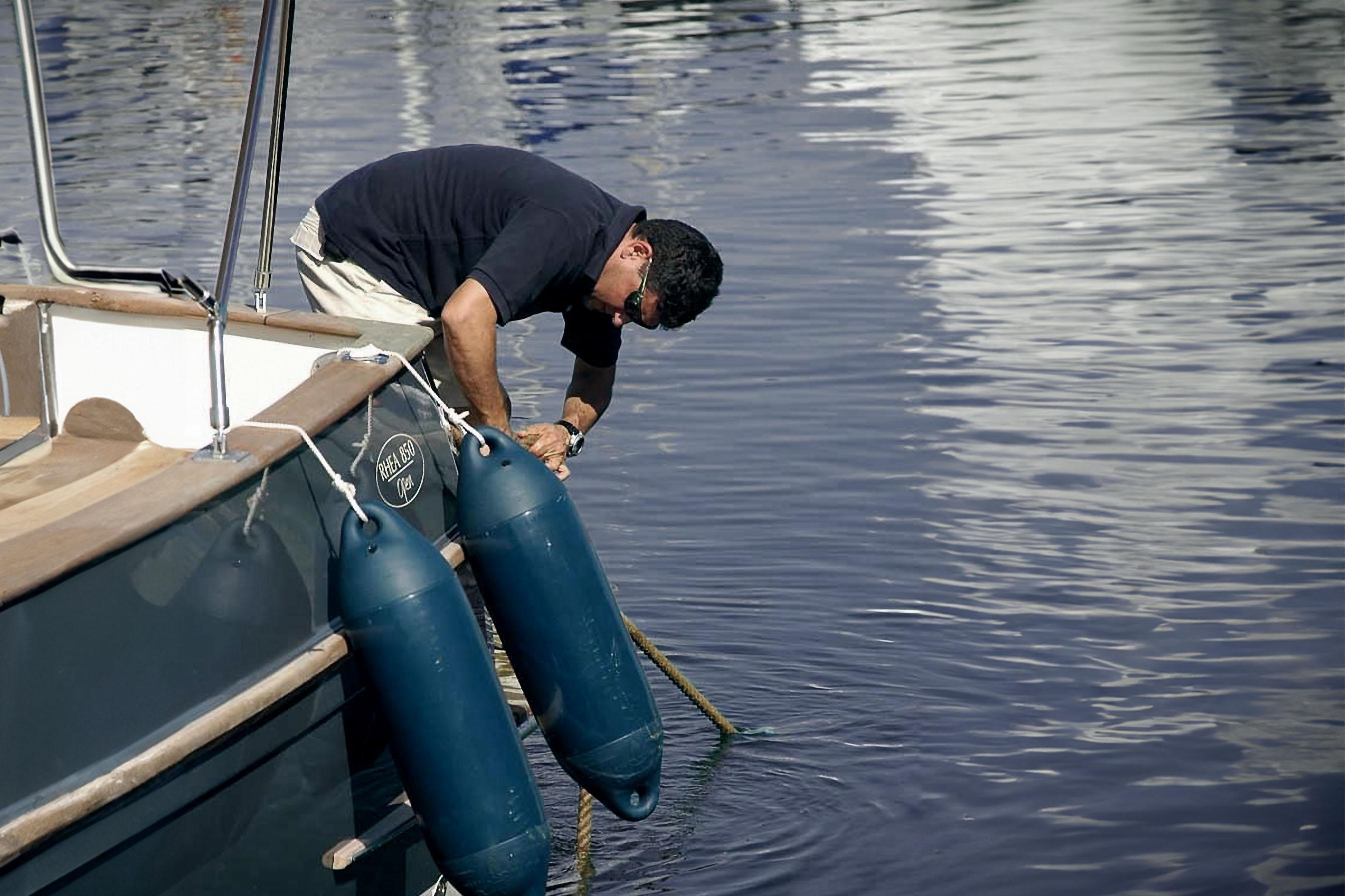 A man working a boat